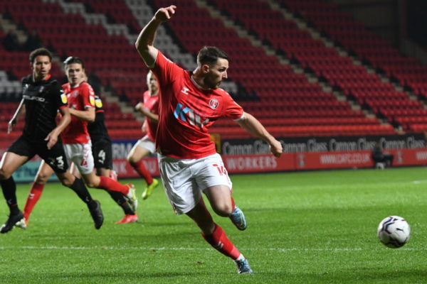 Conor Washington receives a pass during Charlton's fixture against Rotherham United