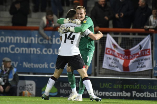Conor Washington celebrates with goalkeeper Craig MacGillivray after bagging his fourth league goal in as many games.