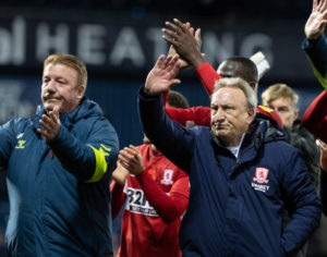 Warnock waving to supporters after match
