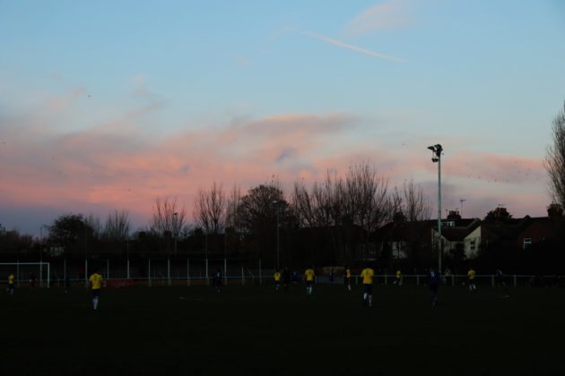 The sunset over a football match
