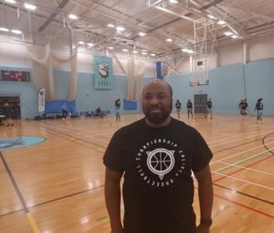 UEL womens basketball coach Tope posing for photo ahead of Challenge cup 