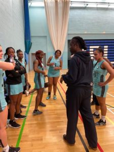 Bisi Owolabi giving a team talk to her netball team at UEL