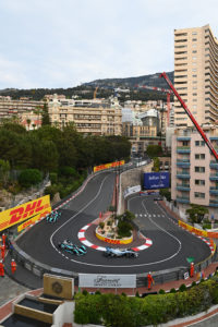 Formula E Drivers going around the hairpin at Monaco.