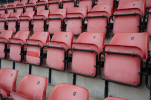 Rows of seating in the Justin Edinburgh Stand. 